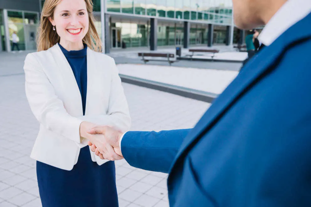 Handshake sealing a partnership
